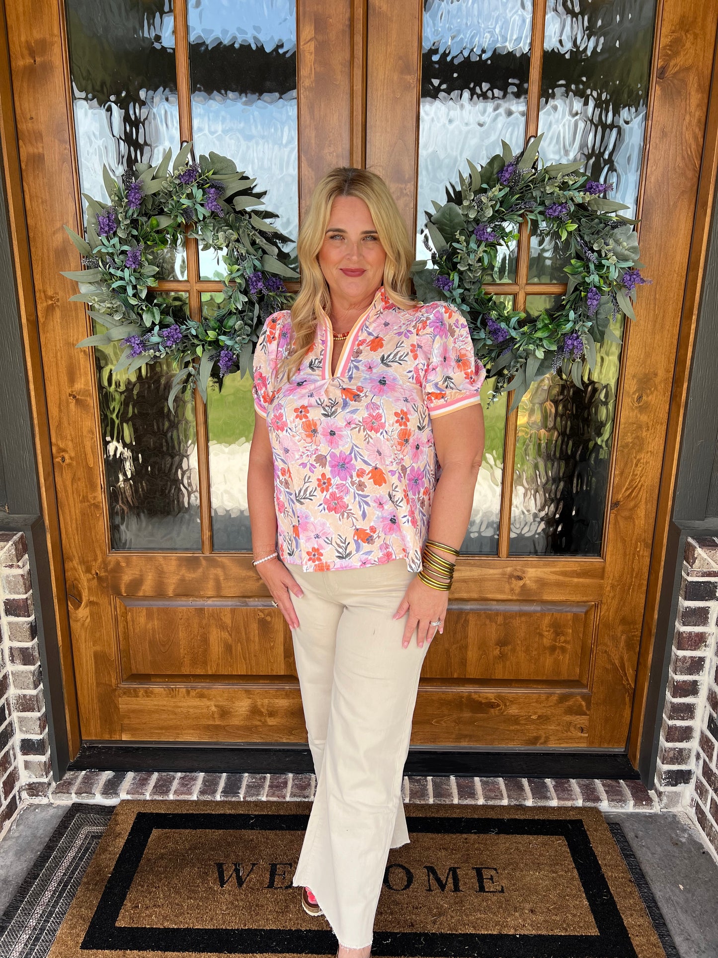 The Cora Peach Floral High Collar Split Neck Top