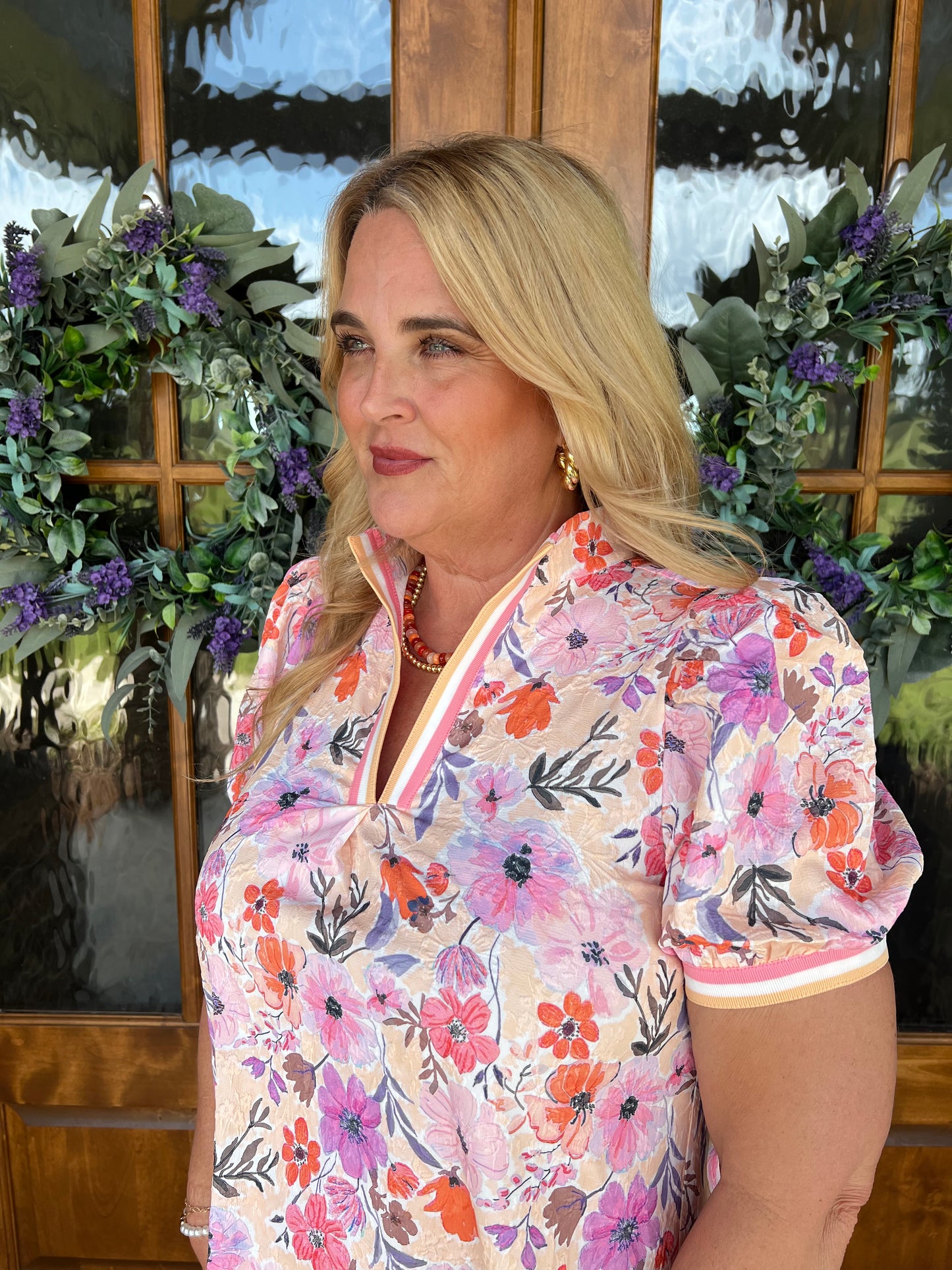 The Cora Peach Floral High Collar Split Neck Top