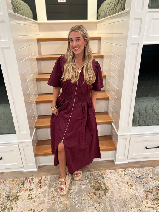 The Wrenley Plum Smocked Waist Front Zip Midi Dress