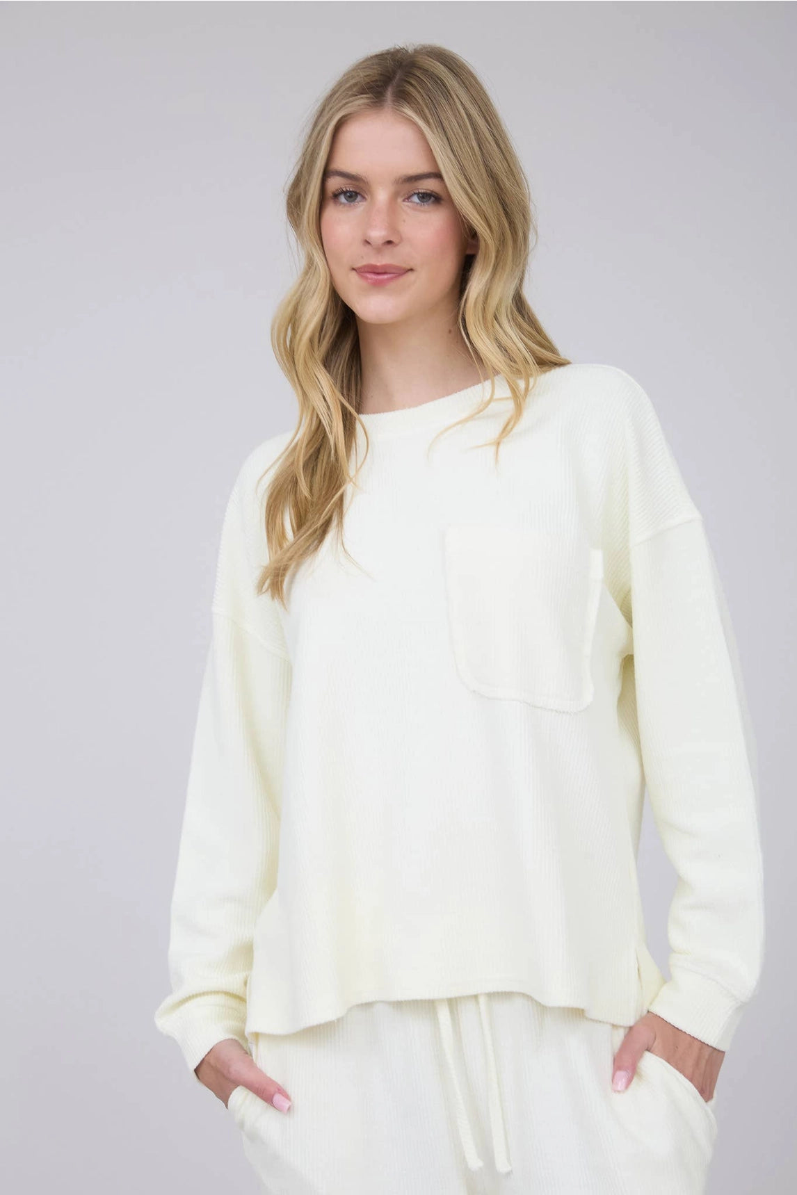 The Madison Cream Washed Pocket Detail Long Sleeve Rib Knit Top