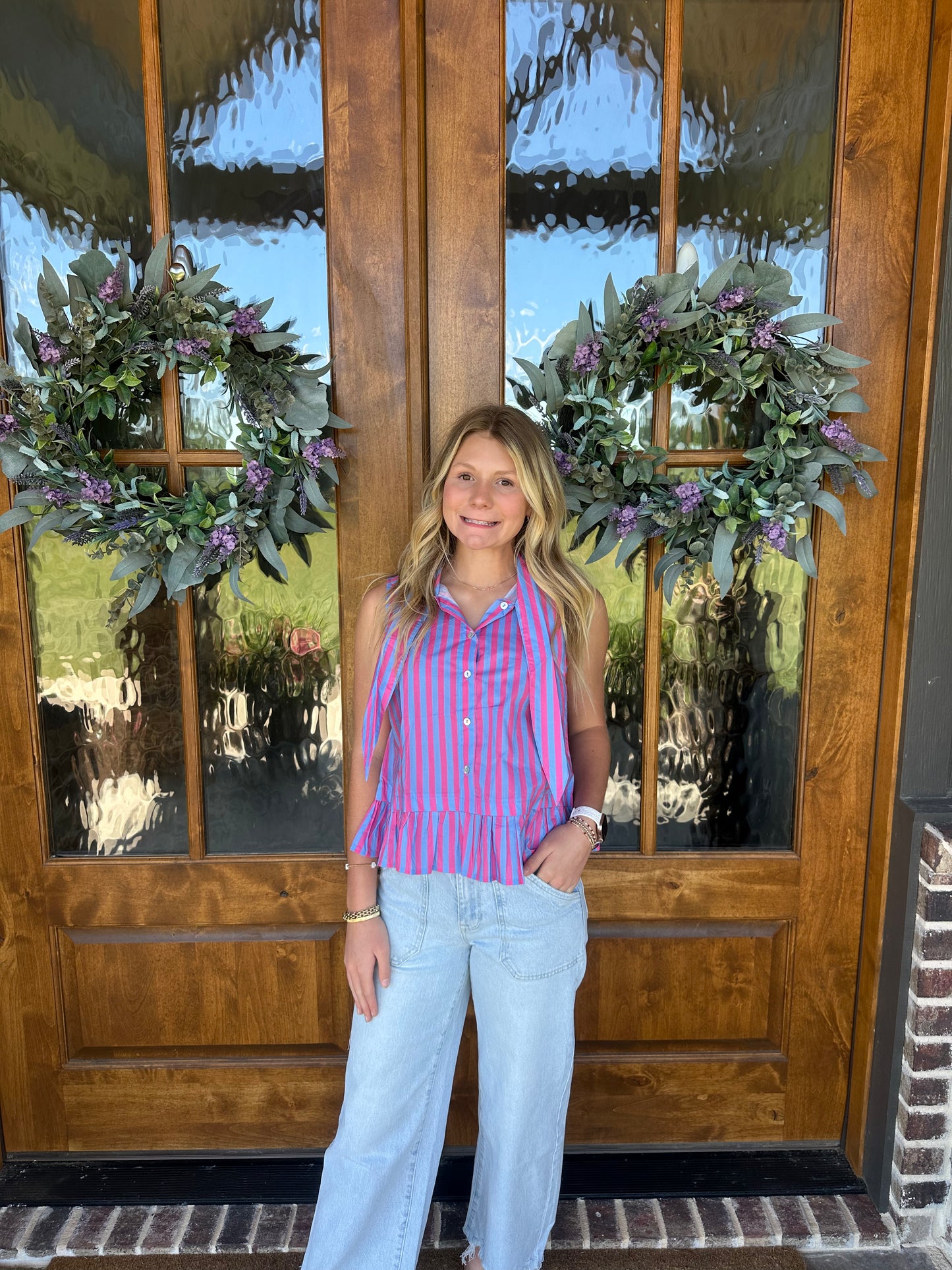 The Penny Blue/Pink Striped Sleeveless Peplum Top