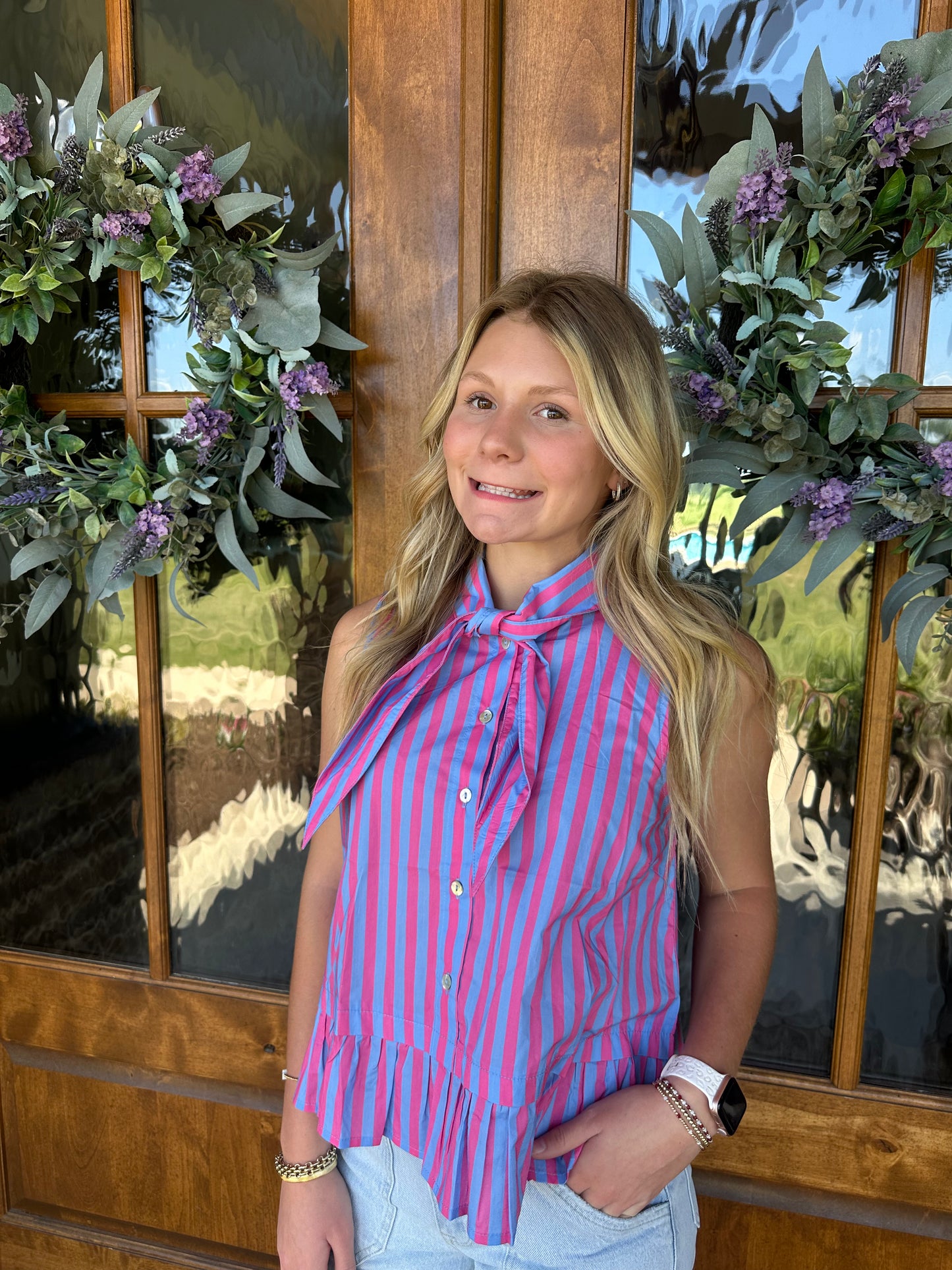 The Penny Blue/Pink Striped Sleeveless Peplum Top
