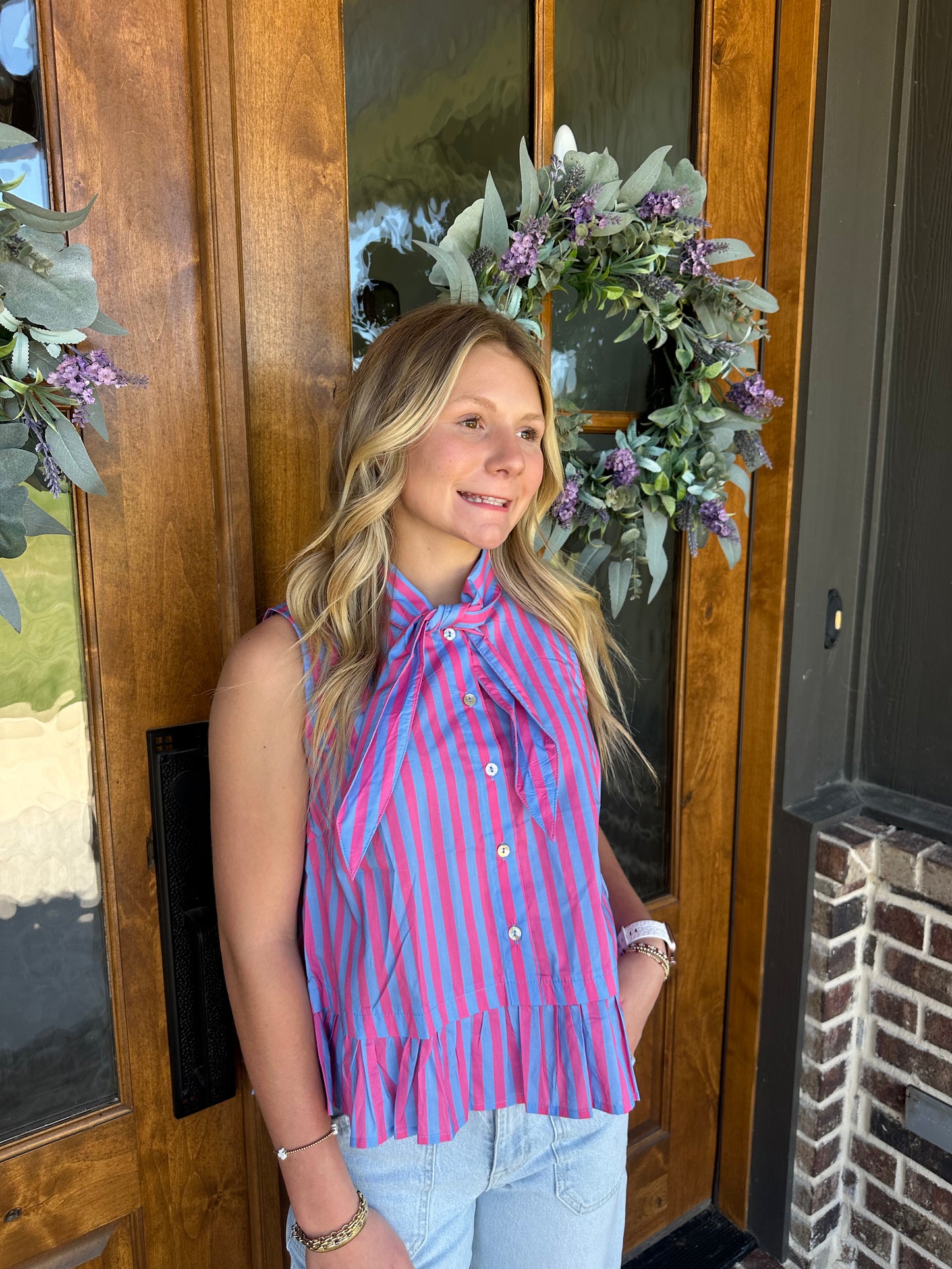 The Penny Blue/Pink Striped Sleeveless Peplum Top